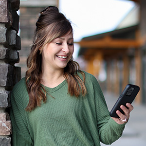 woman looking at phone