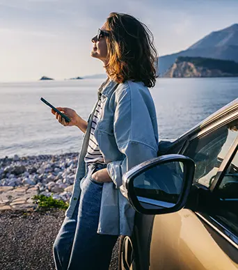 woman traveling with car